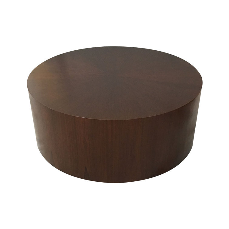 Solid drum coffee table discount